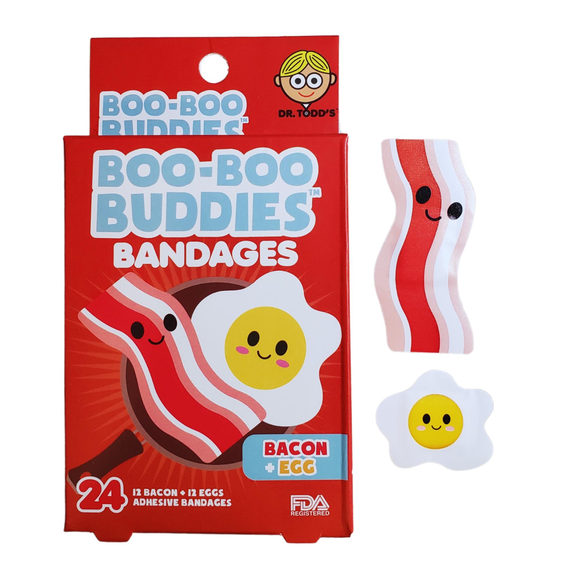 BBoo Boo Buddies Bacon & Egg Bandages box with 24 bandages, featuring fun bacon and egg shapes. Two bandages are shown: one bacon-shaped and one egg-shaped with cute smiley faces.