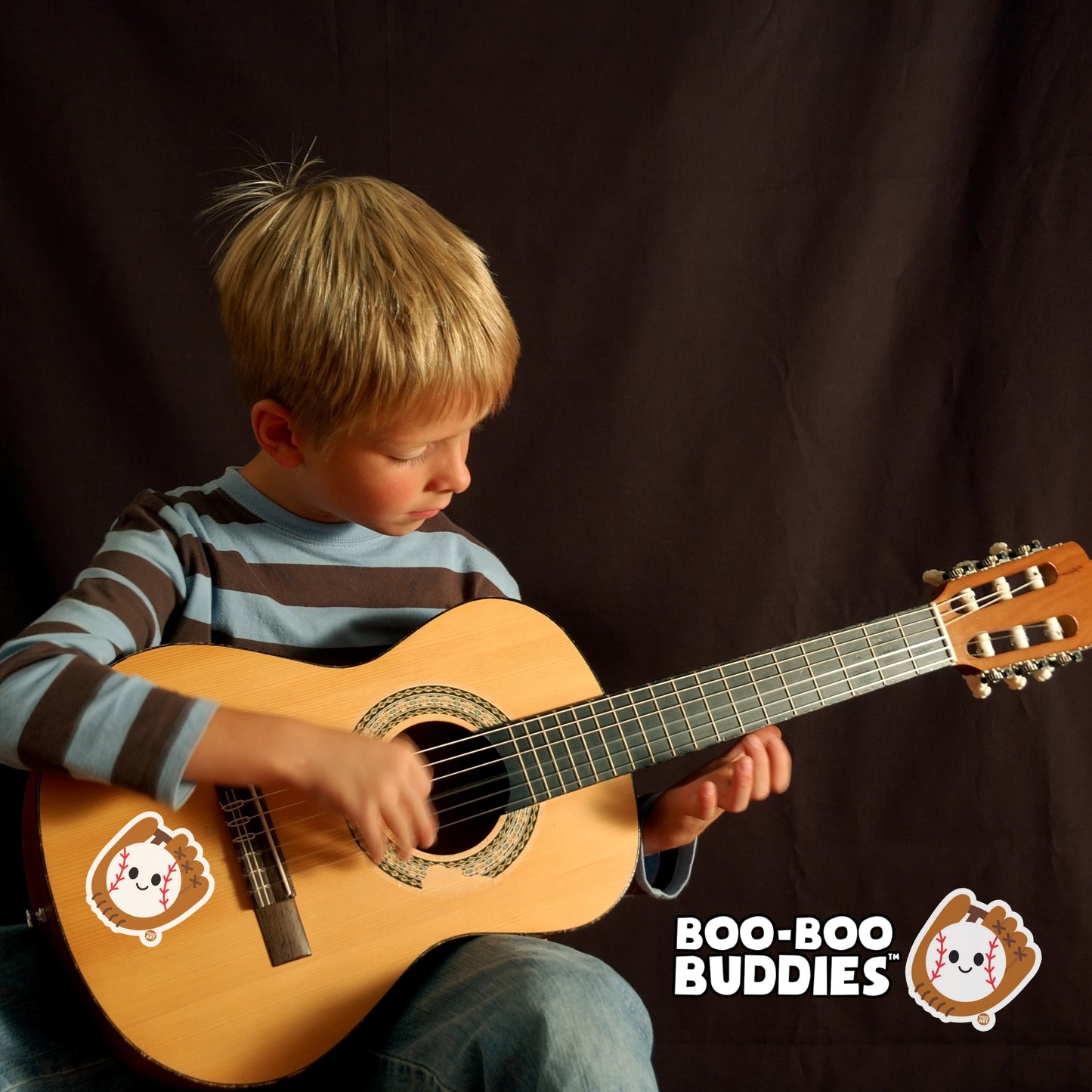 Boo-Boo Buddies baseball sticker on guitar — cute collectible sports vinyl decal for kids music gear & school supplies.