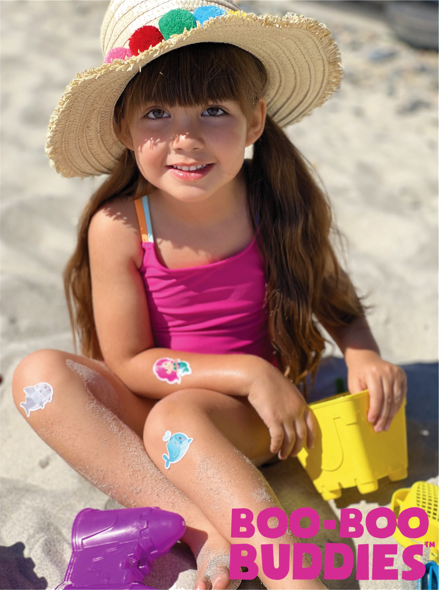 Kid wearing Boo Boo Buddies Bandages at the beach