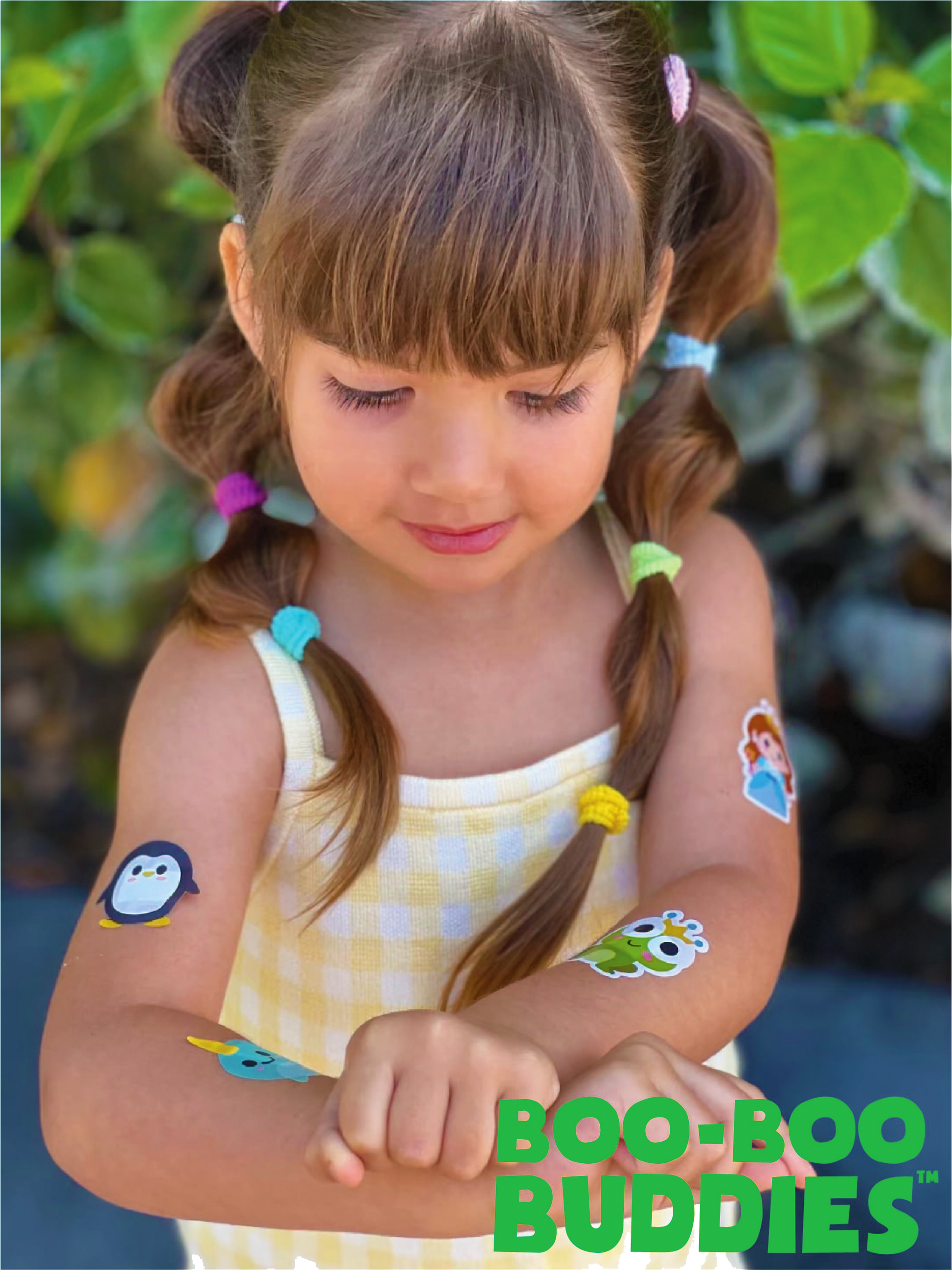 Girl wearing multiple Boo Boo Buddies Bandages