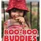 Child eating a strawberry with Strawberry and Watermelon Boo Boo Buddies Bandages